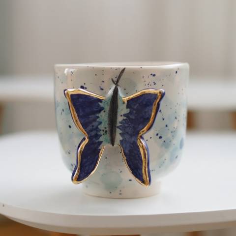 Butterfly in multicolor blue