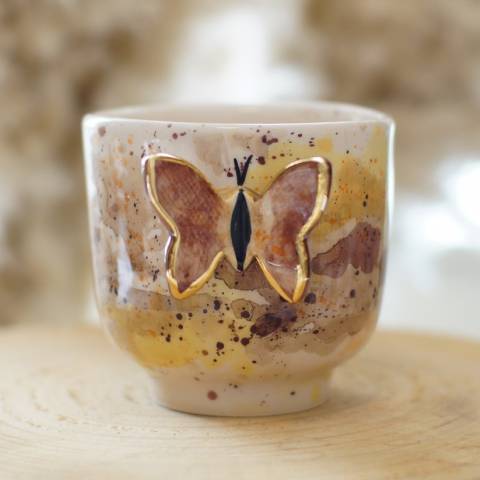Butterfly in multicolor brown