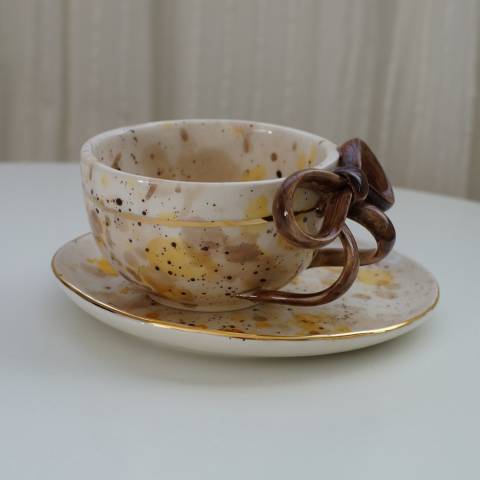 Brown bow cup&saucer